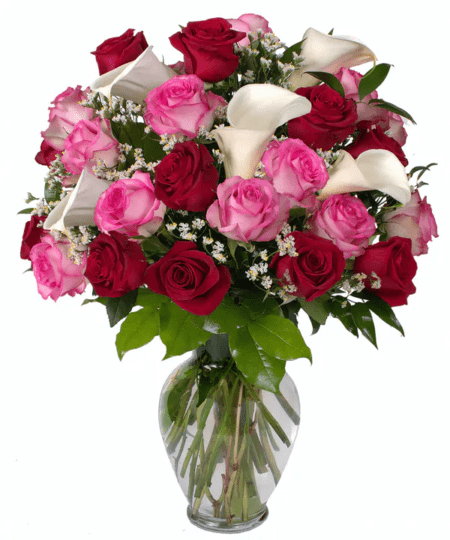 At last. A large and lovely bouquet that says it all (and then some). Passionate premium long stem red roses, romantic premium long stem pink roses, and stunningly beautiful white Calla lilies, hand-designed in a premium clear glass vase.